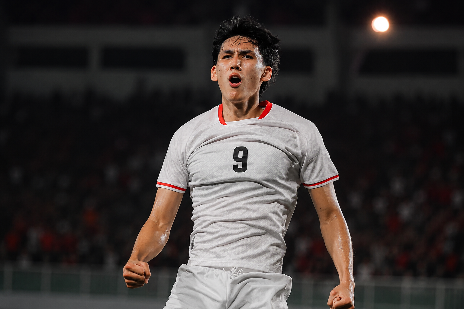 Penyerang Timnas Indonesia Mitchell Baker meluapkan kegembiraan usai cetak hat-trick lawan Kamboja (27/7/2026).